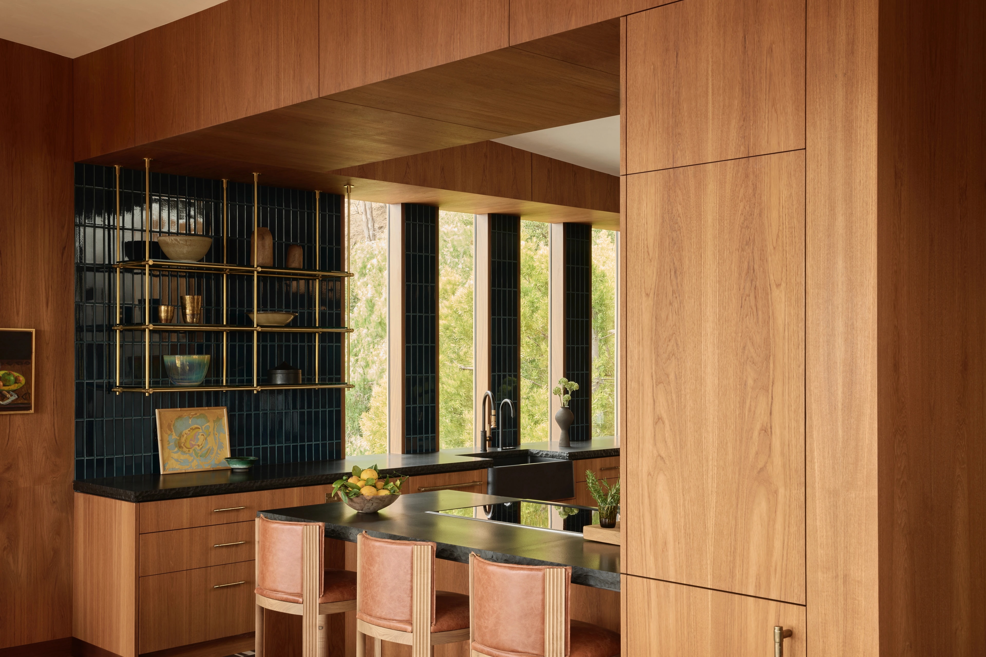 Wood kitchen with dark-tile backsplash