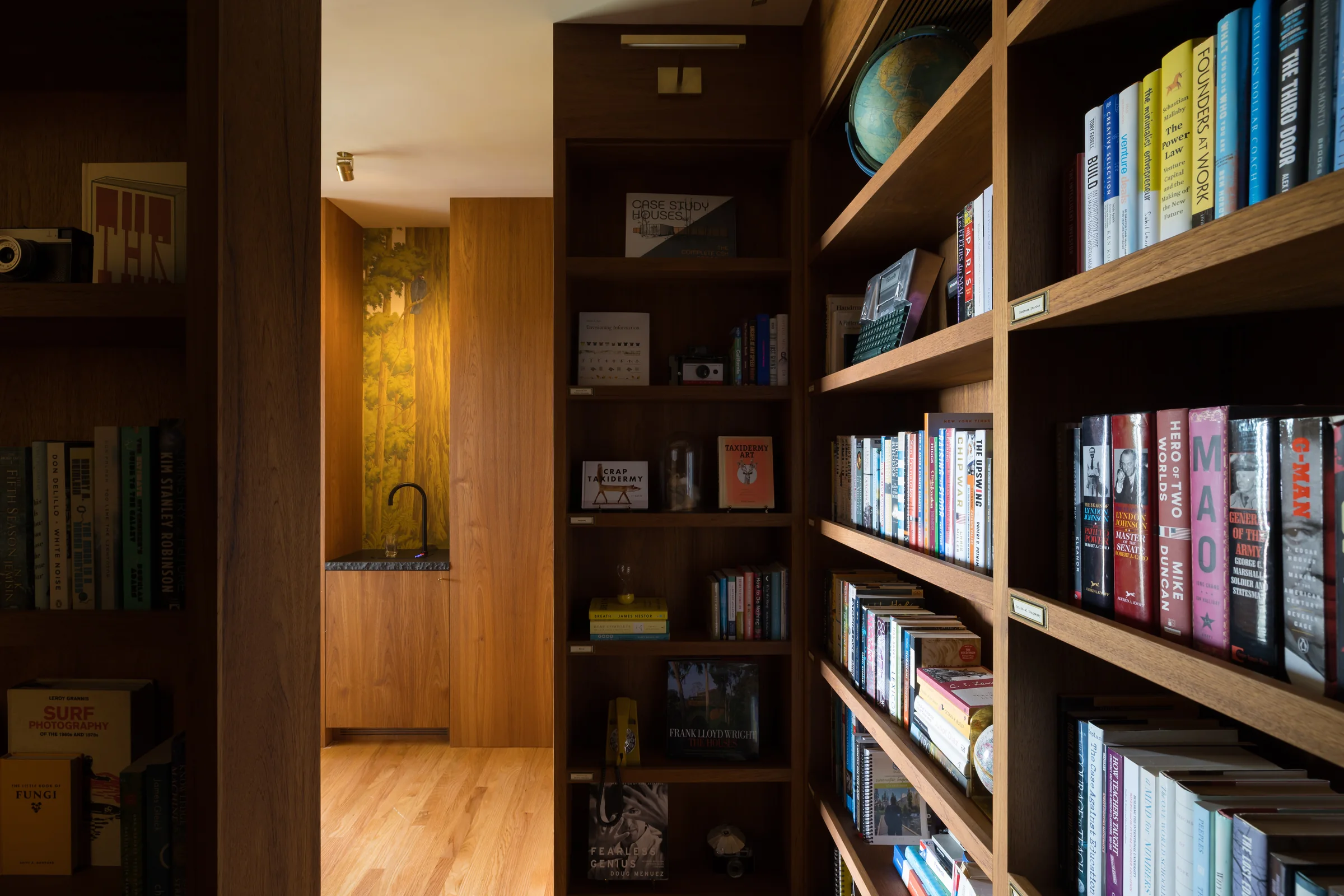 The book labyrinth: floor-to-ceiling shelves lining the hallway