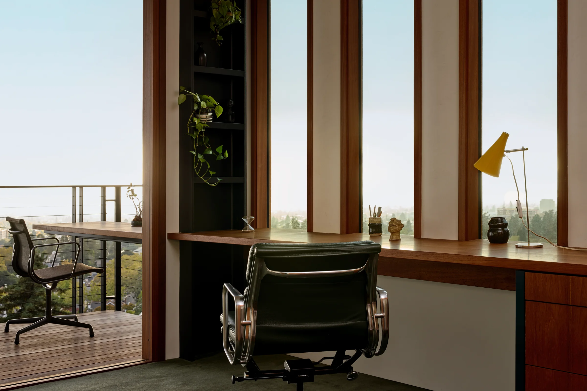 Desk running the length of the window wall out to the deck