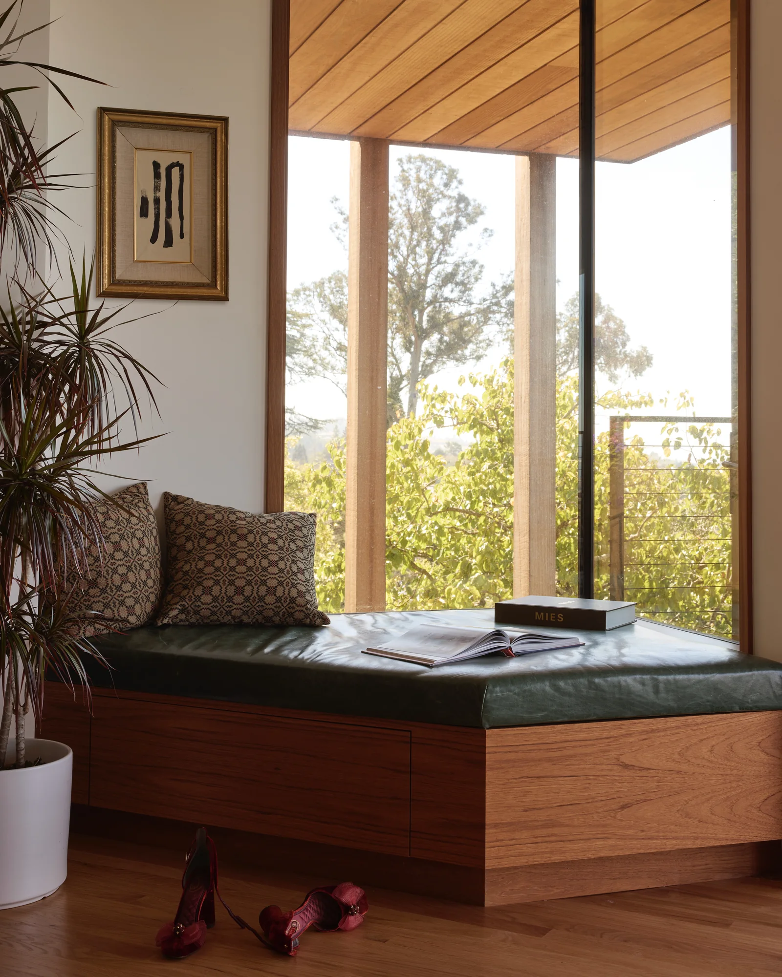 Built-in window daybed looking out into the trees